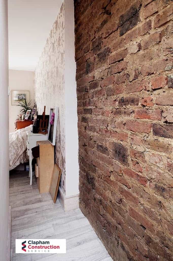 completed loft conversion with visible brick