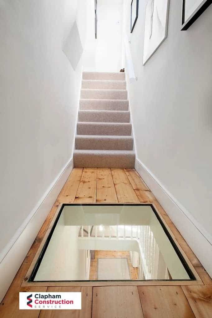 ferry-road-loft-conversion-glass-details completed loft conversion glass in wooden floor