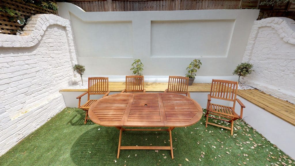 completed home extension garden white bricks