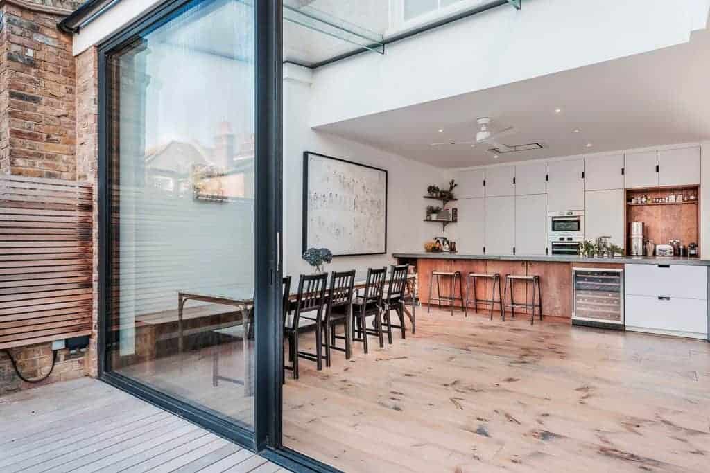completed home extension open plan kitchen floor to ceiling door