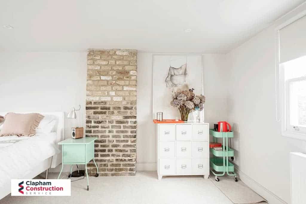 finished loft extension with stylish white bedroom