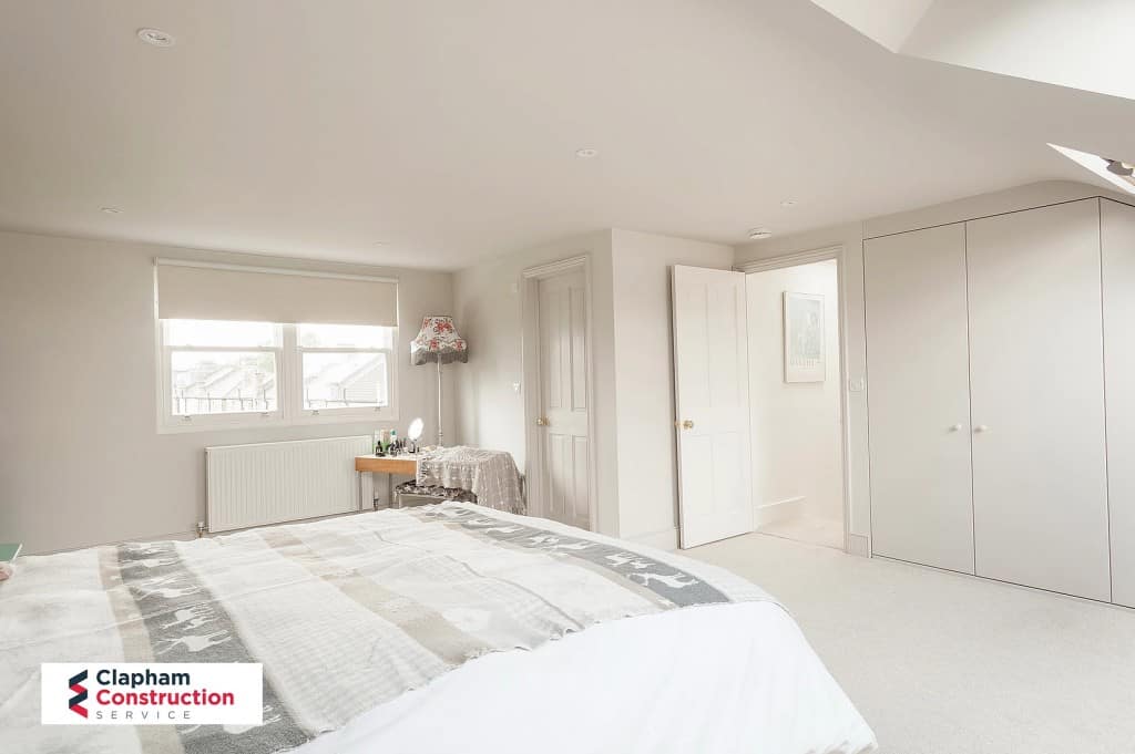 finished loft conversion with master bedroom and white bathroom