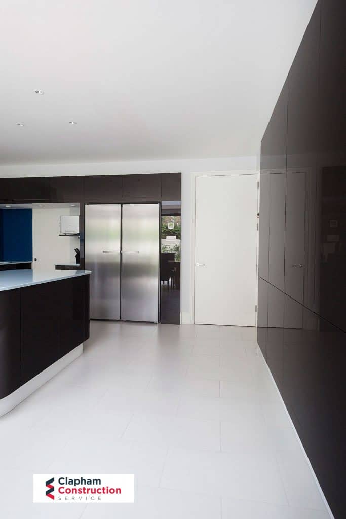 completed home extension floor to ceiling cupboard black kitchen