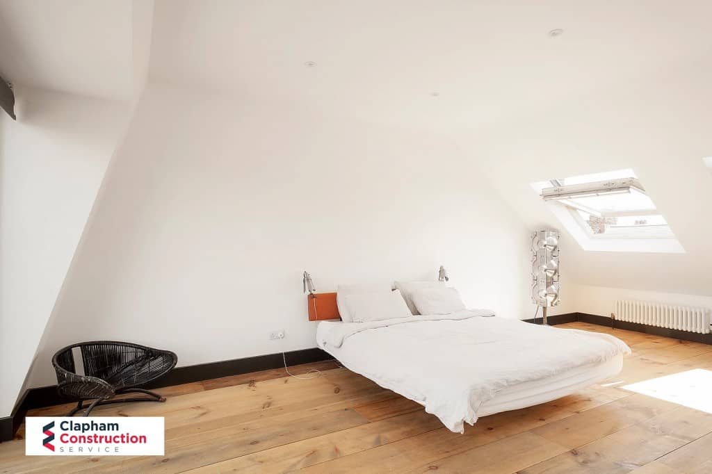 finished loft extension high ceiling white
