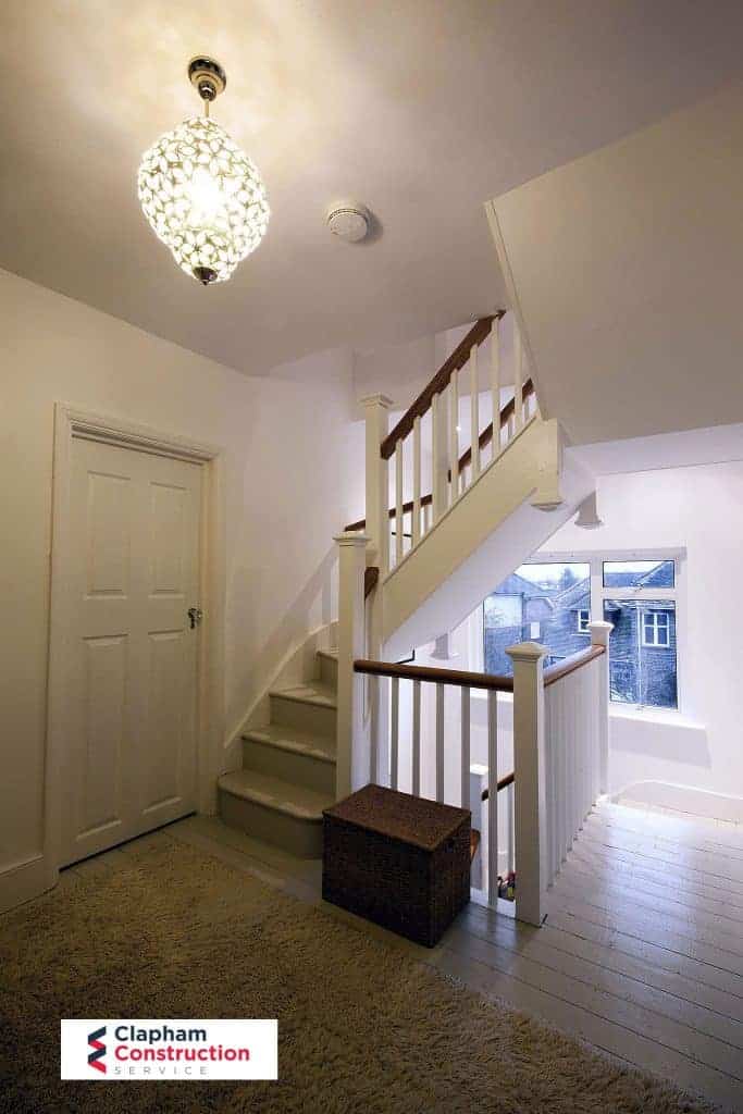 completed loft conversion staircase white and wood
