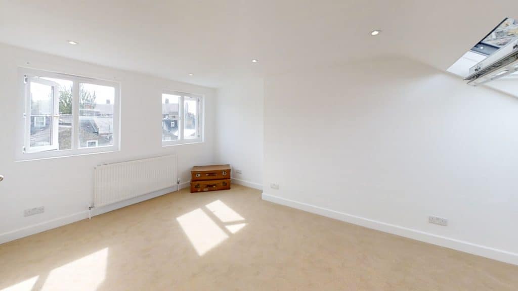 completed loft conversion with bag in corner