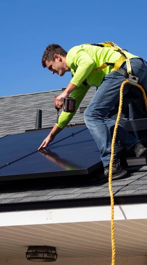 a man on a roof